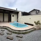 Casa com piscina Santa Terezinha